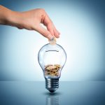 invest to energy concept - euro in bulb - piggybank