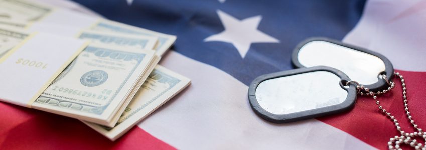 american flag, dollar money and military badges