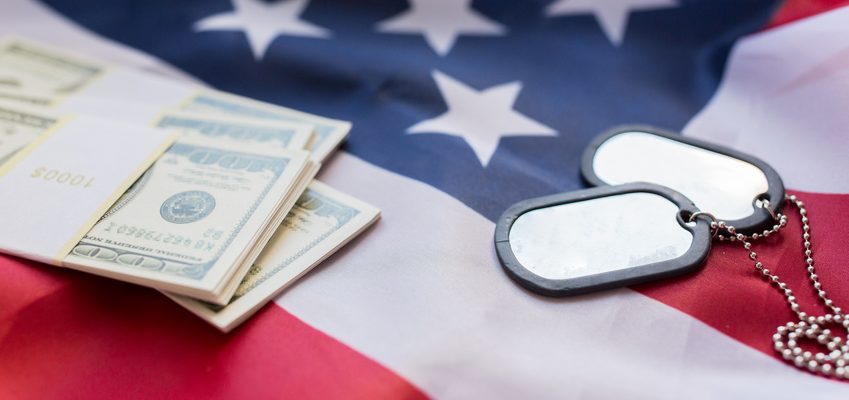 american flag, dollar money and military badges