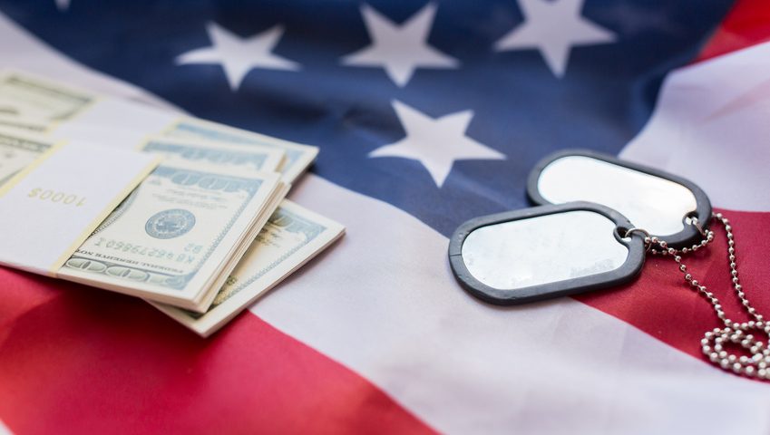 american flag, dollar money and military badges